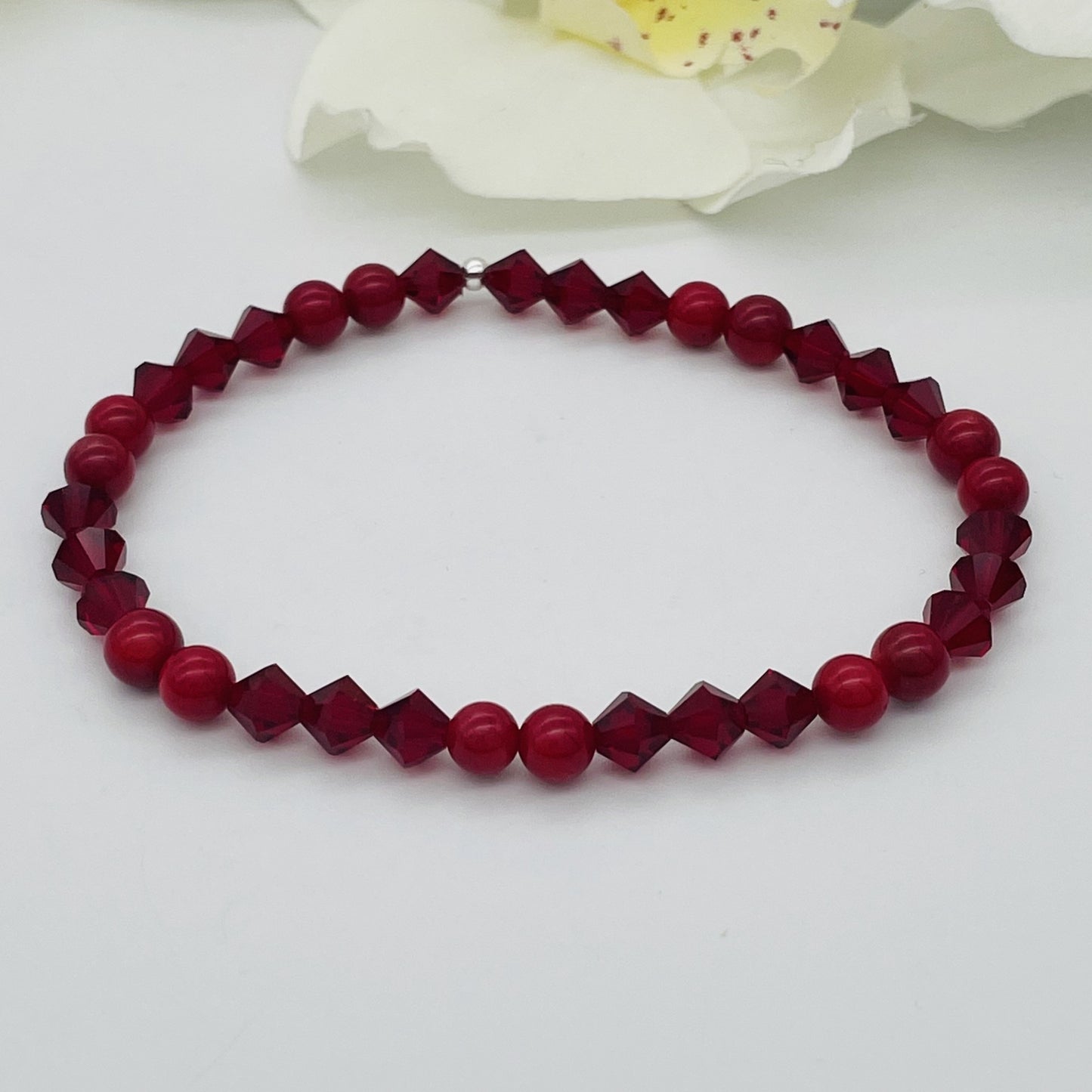 ST1504BL Red Dyed BambooCoral Bracelet 8"