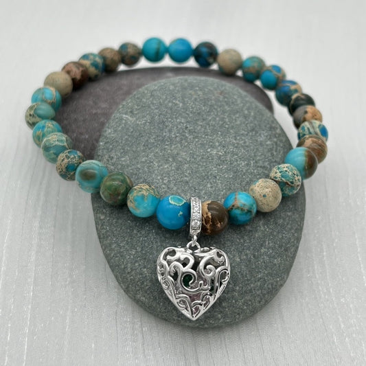 ST1831 Blue  Jasper Bracelet 7"x 6mm.