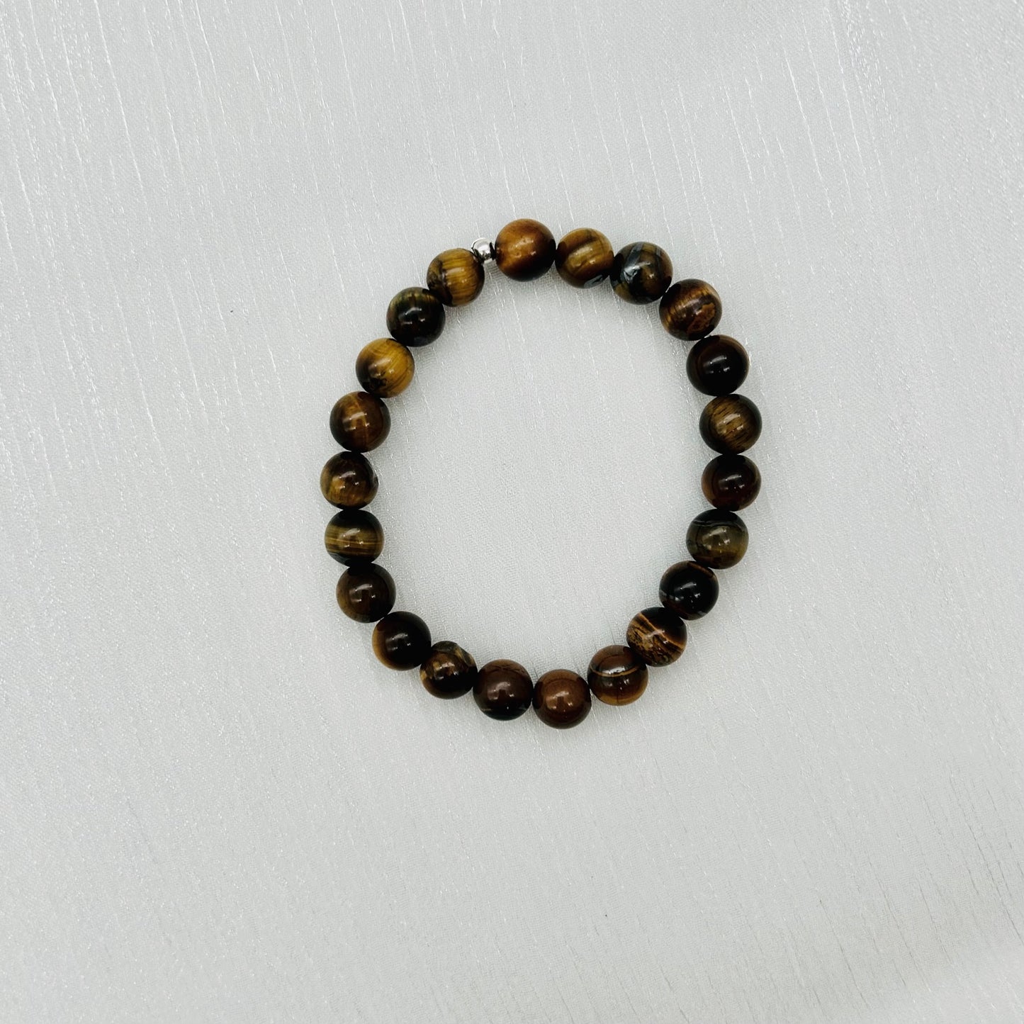 ST-1023  8mm. X 7" Bracelet Tiger Eye