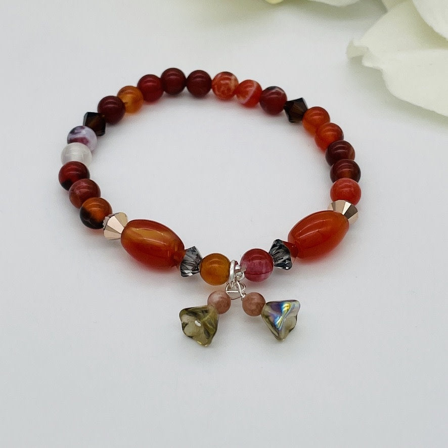 ST1556  BL 7" red agate & sun stone