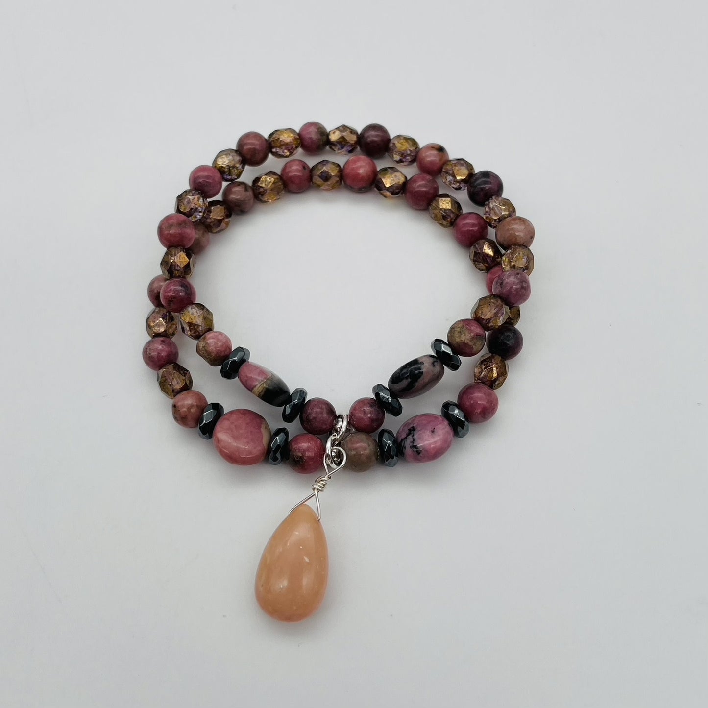 ST1772BL Rhodonite, Opal 7"