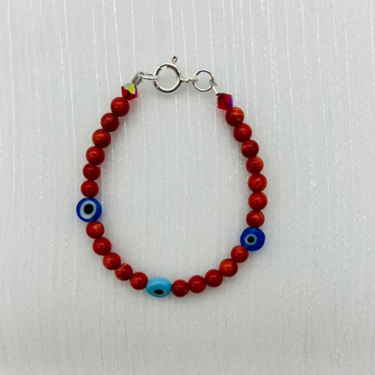 CH947BL Red Dyed Bamboo Coral With Eyes Bracelet 5.5"