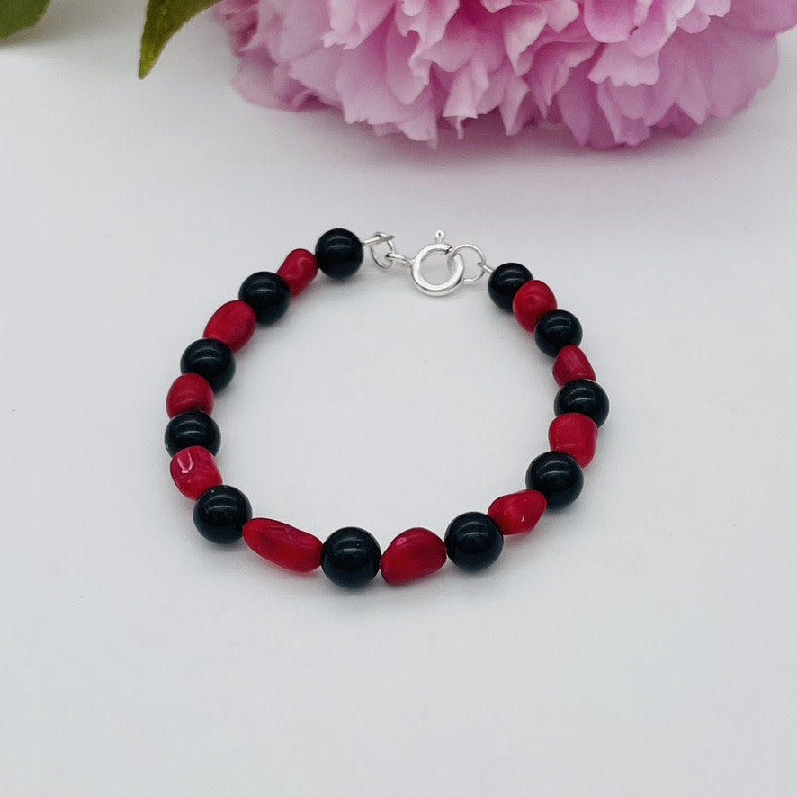 CH941BL Rede Dyed Bamboo Coral and Onyx Bracelete 6"