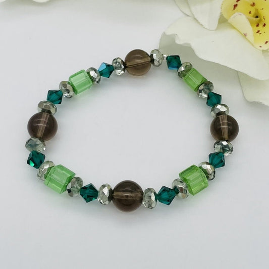 ST1505BL Smoky Quartz with Green Crystals 7"