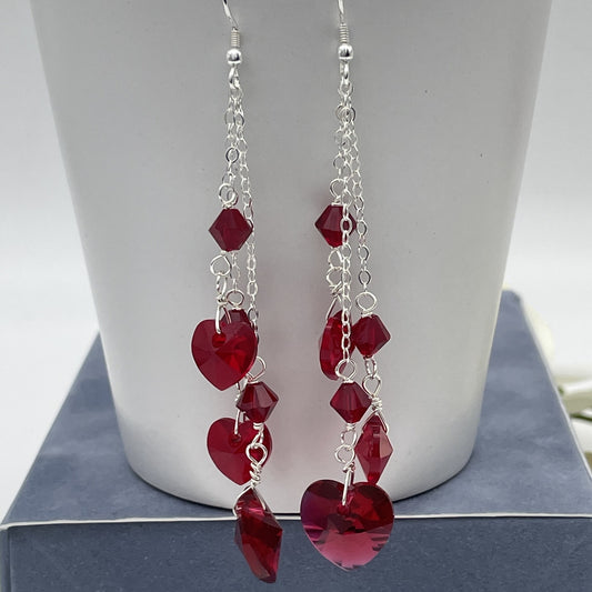 C1244ER SW Garnet Hearts Earrings  4"