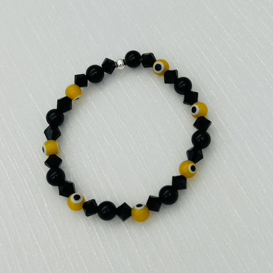 ST1755BL Black Onyx and glass Yellow eyes 6.5"