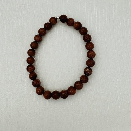 C1235BL Goldstone Bracelet 8mm.8"