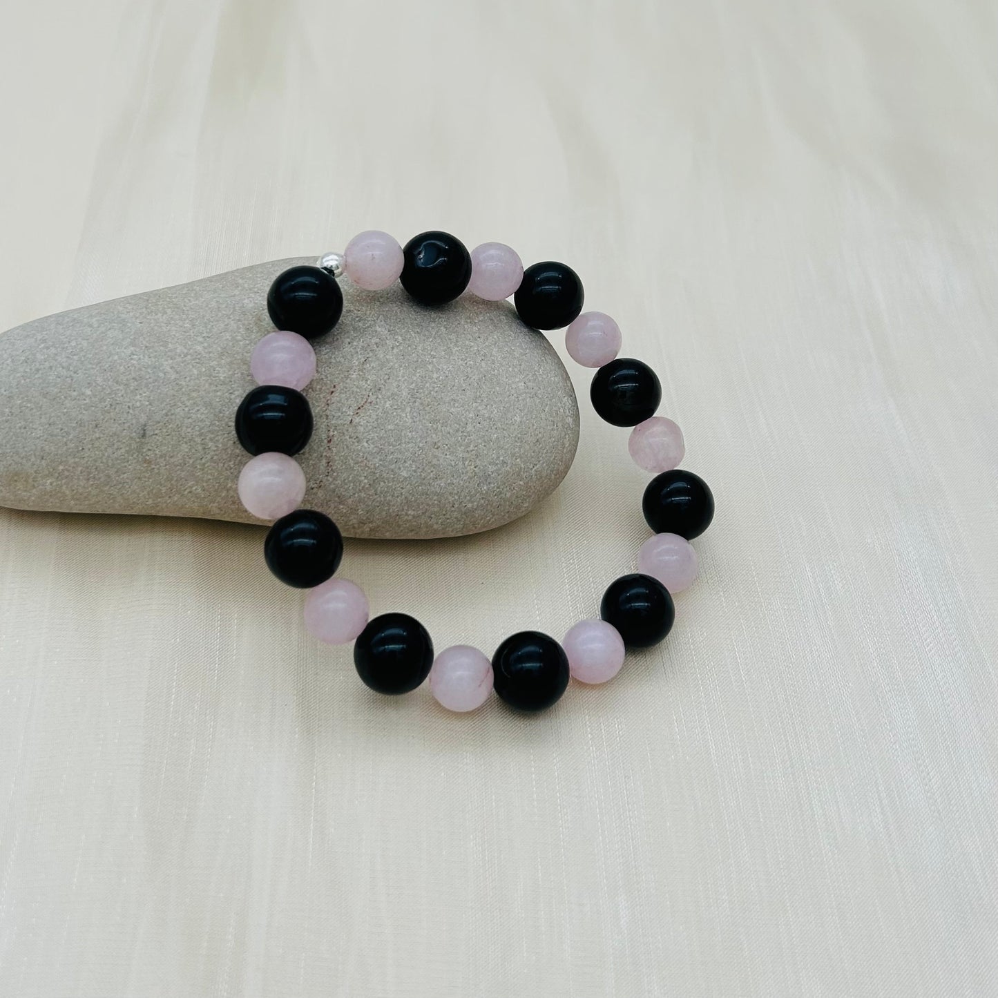 ST1081BL Rose Quartz & Black Agate7"