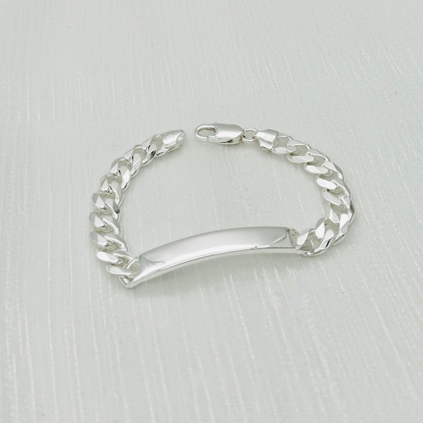 S1654BL Curb ID Bracelet 8mm.x7"