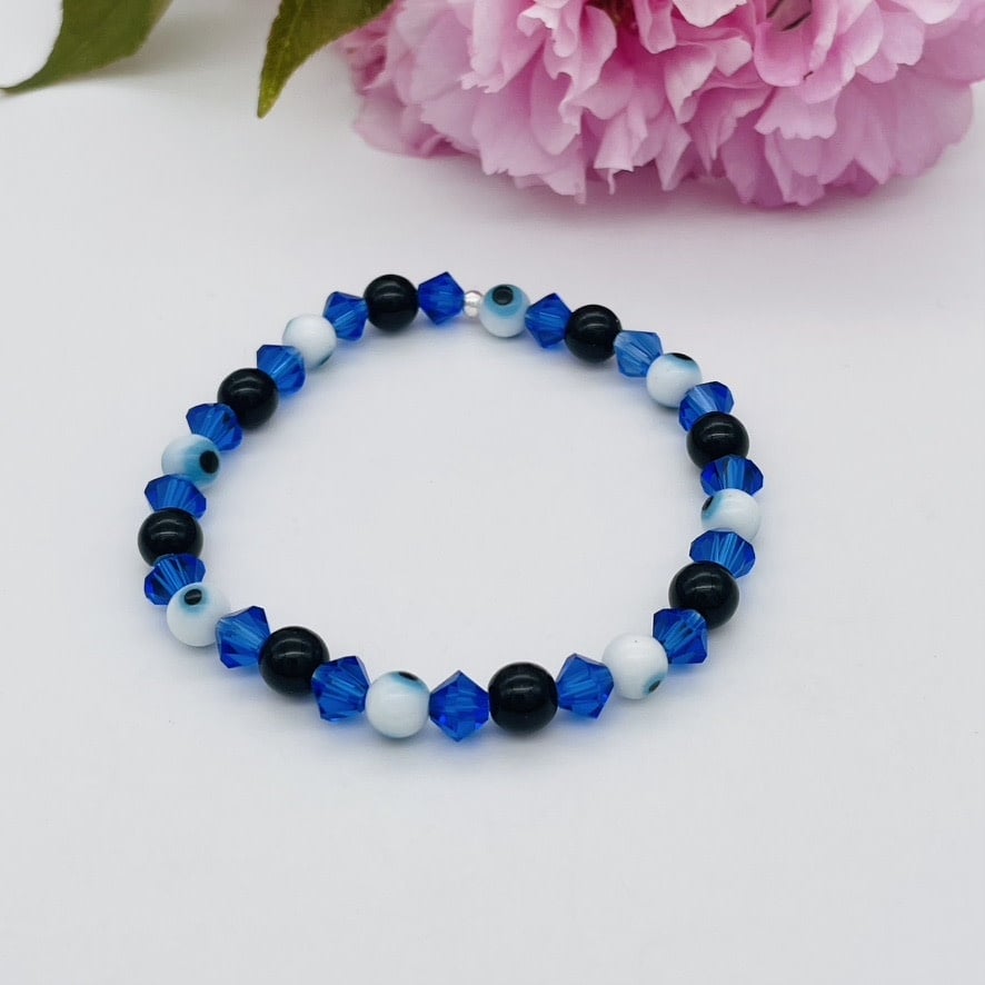 ST1755  Blue Eyes W / Onyx Bracelet 7"