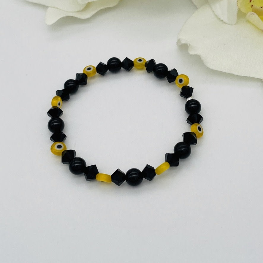 ST1663BL Onyx W/ Eyes Yellow