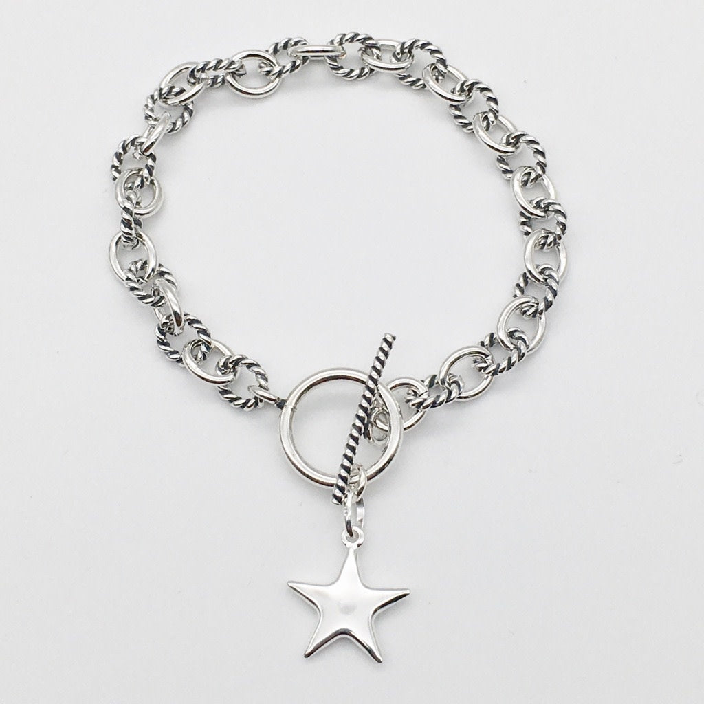 S1540BL Oval Cable Bracelet With Star 7"