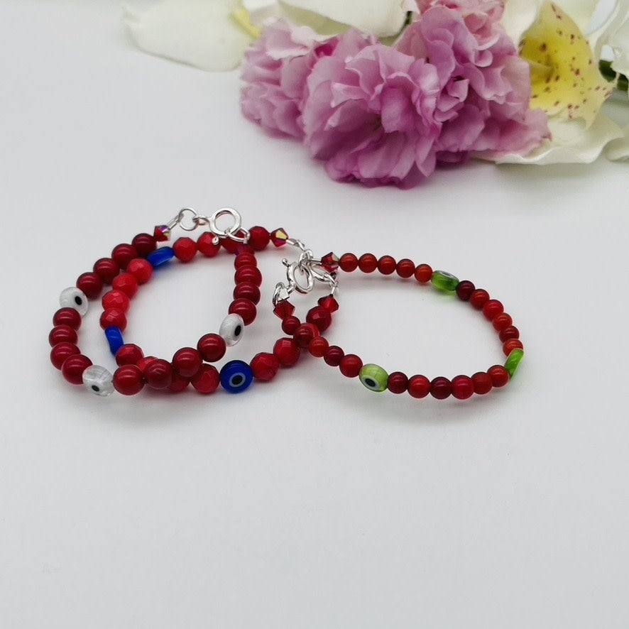 CH947BL Red Dyed Bamboo Coral With EyesBracelet 6"