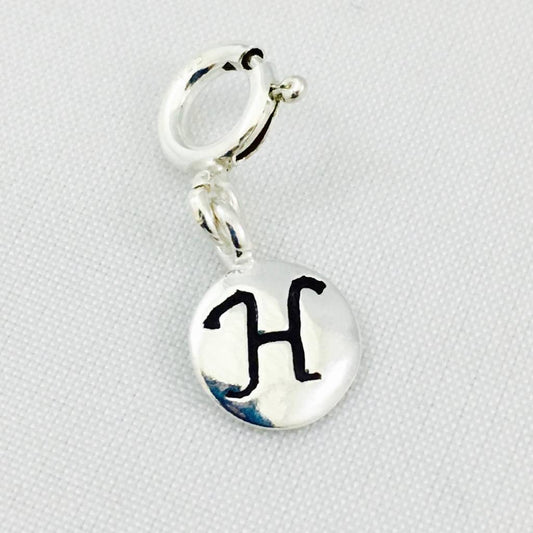 S1163 Charm H