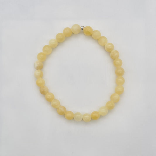 ST-1032  6mm. Bracelet Calcite 7"