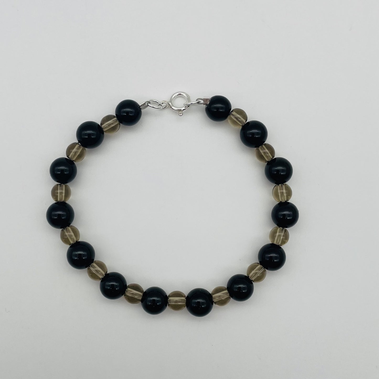 ST-1184 Bracelet  Onyx & Smoky 8"