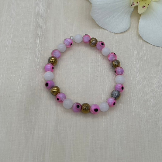 CH977BL Snow Quartz with Pink Eyes Bracelet 6"